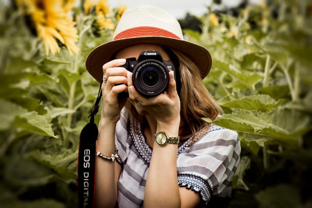 women taking a picture in a field 