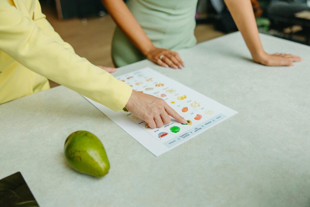 nutritionist showing client meal plan